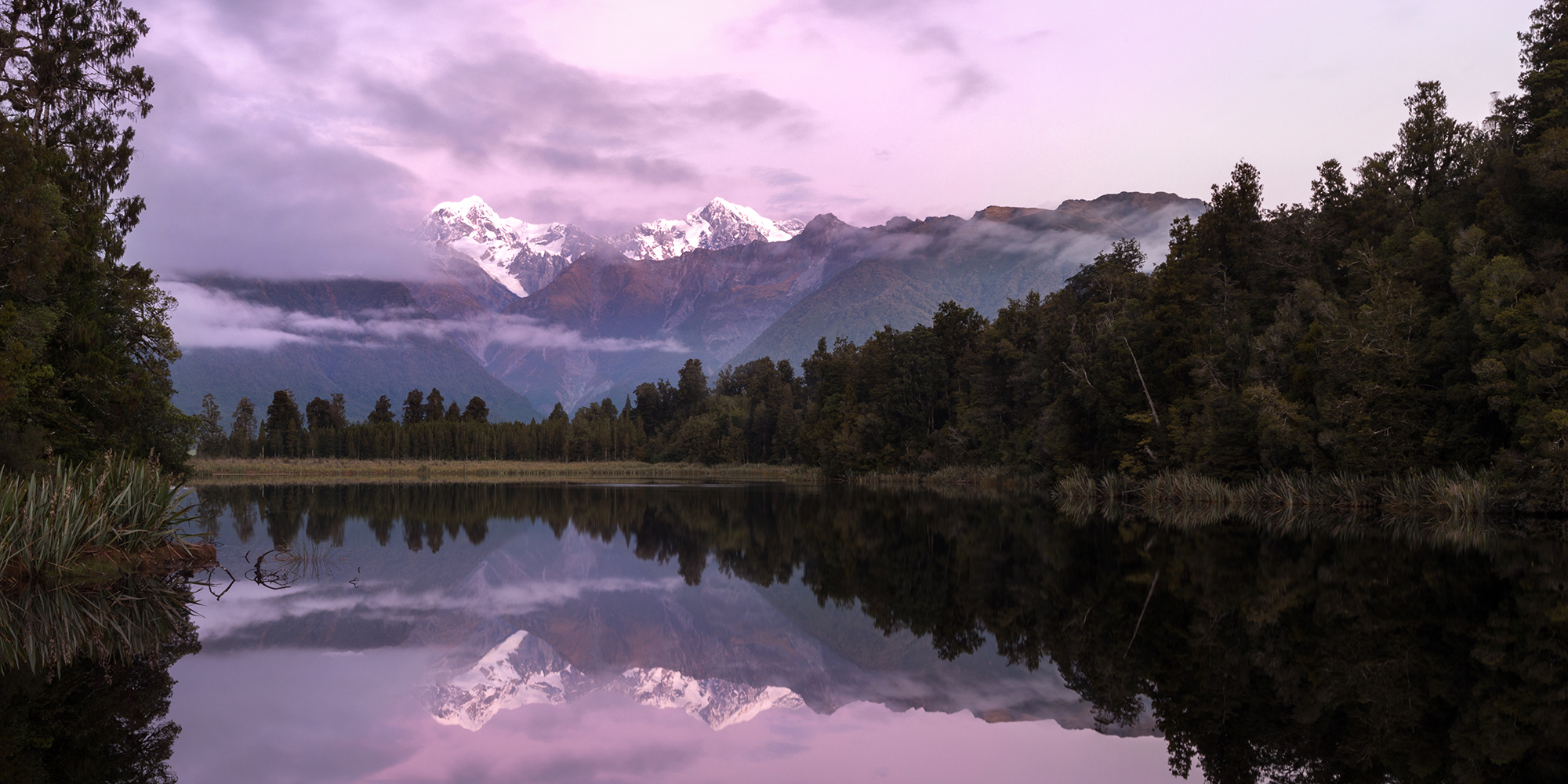 View of Southern Alps from Lake Matheson near Fox Glacier
